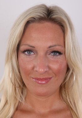 Blonde came to a porn studio to report about new boobs and tattoo on lower back