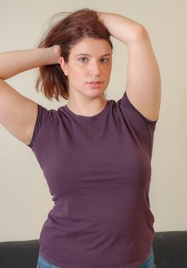 Chubby hottie takes off T-shirt and pink bra to tease all with her big tits