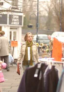 Sultry MILF takes off all clothes to pose after walking in cold weather