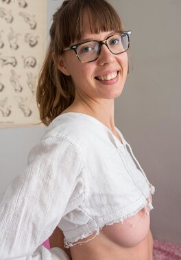 Geeky babe named Leah shows her natural boobs and beyond