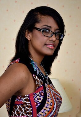 Cute teen Diana Love strips and leaves nothing on but her glasses