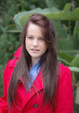 Sweet babe walks around big mansion dressed in sexy thong and red cloak