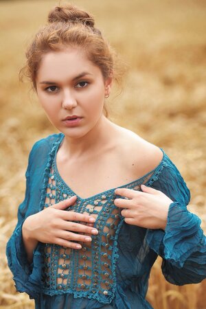 Farmer chick with red hair looks too sexy and appetizing to be dressed