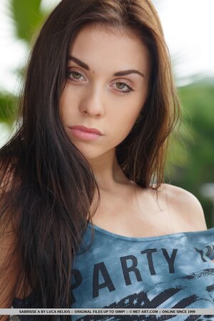 Young model with elegantly-trimmed twat and beautiful asshole undresses