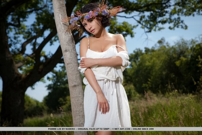 Tender chick felt free for the first time hugging a tree in the nude