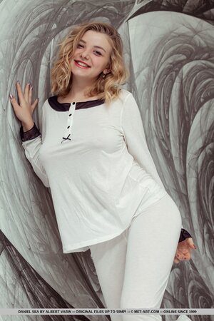 Teen with playful eyes didn't expect she could pull blouse up showing titties