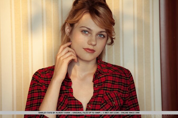 Barbie in a checkered shirt performs XXX solo show on the rose petals