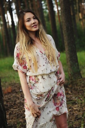 Ukrainian gal chooses a secluded place in the forest and starts playing with twat