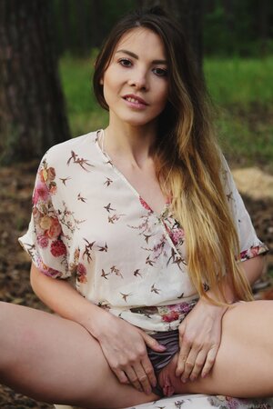 Ukrainian gal chooses a secluded place in the forest and starts playing with twat