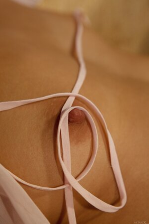 Cute Latina plays with maraca while stripping and masturbating shaved pussy