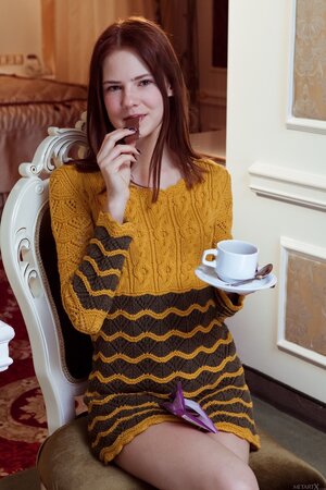 20-year-old skinny redhead plunges two fingers into bald vagina halfway