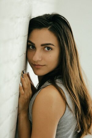 Obscene female sat by the table but decided first to masturbate a bit