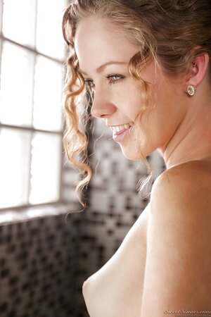 Yoga girl comes to the shower room where willingly poses being naked