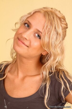 Blonde beauty Dory takes off plaid skirt and has fun with Russian stallion