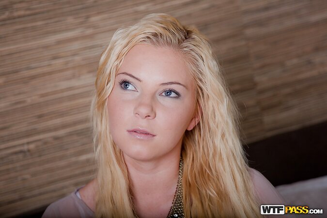 Naughty European blonde bimbo strips down and poses hot on the fur