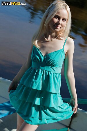 Blonde chick Mya Diamond undresses and masturbates right on the boath