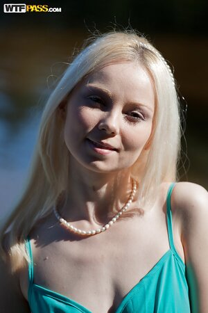 Blonde chick Mya Diamond undresses and masturbates right on the boath