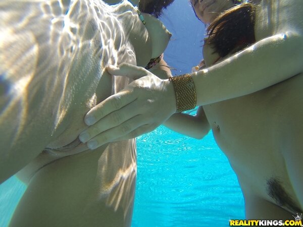 Three lovely girls hop in pool to touch assets and share sweet kisses