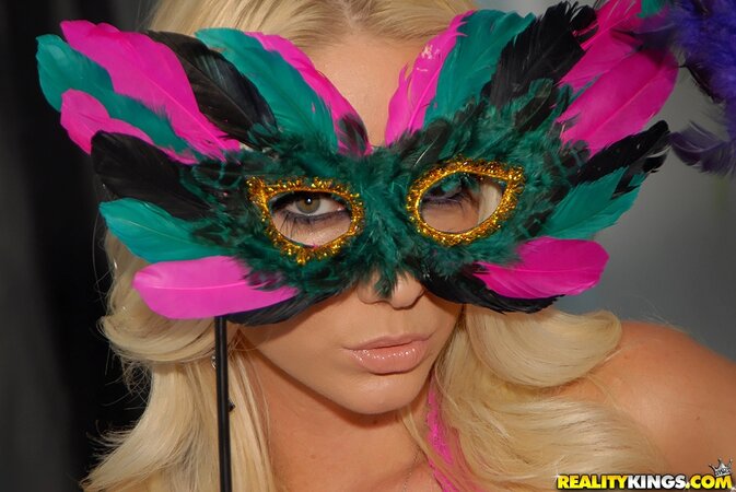 Blonde and her red-haired mistress show they are ready for carnival