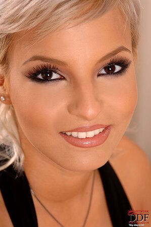 Female with black eyes knows she is sultry and agrees to take part in XXX shoot