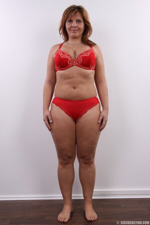 Middle-aged porn model with plump body has nothing against stripping