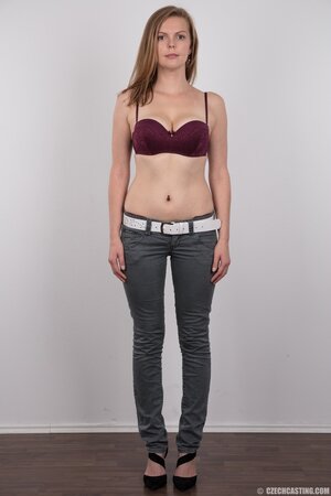 Cute chick takes official outfit down to be close to fans in the nude