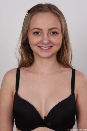 Young woman understands she can't hide from camera and has to pose in the nude