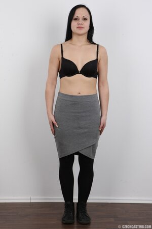 Girl with eyes the bleakest black and the same underwear happy with nakedness