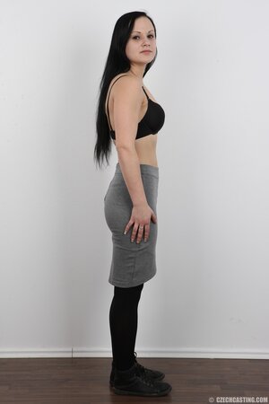 Girl with eyes the bleakest black and the same underwear happy with nakedness