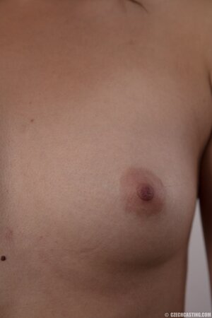 Slut stripped taking clothes down item by item baring tits first and then asshole
