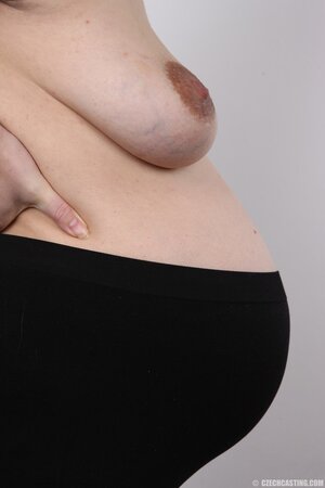 Pregnant temptress with hairy pussy doesn't know how to keep belly under outfit