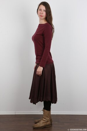 Young woman from village has come to town to be a XXX model stripping on camera