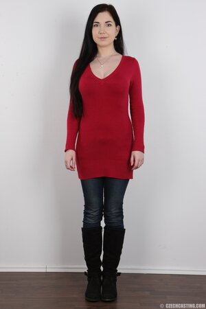 Adorable brunette with long hair demonstrates perky boobs and not only