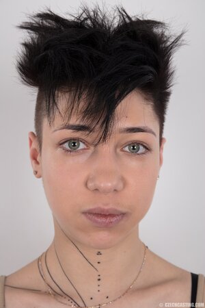 Hungarian diva Yulia Bright looks like a boy with her new haircut and flat body