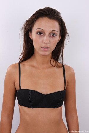 Latina teen honey takes clothes off item by item remaining completely naked