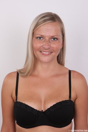 Female with freckled face ready to get naked and expose her hospitable opening