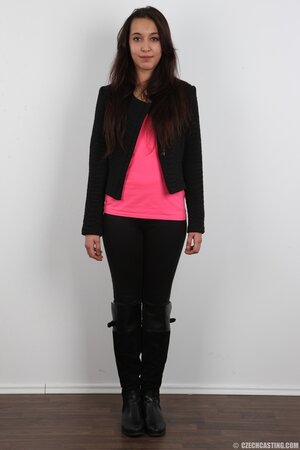 Czech whore Rita Sinclair gets naked and sits on a stool taking obscene pose