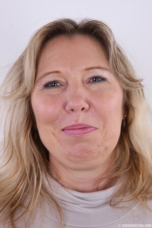 Mature woman flaunts ample natural tits and tushy for all the prying eyes