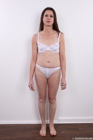 Middle-aged female denudes what is hidden under white underwear more than often