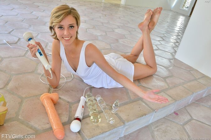Blonde girl has a very wide butthole that she makes even larger with toys