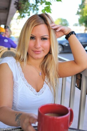 Morning coffee excites chick and she goes stripping to pierced pussy