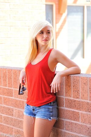 Hot girl gets rid of unnecessary clothes and goes to the volleyball court