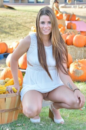 Babe with pierced nipples chose the biggest pumpkin cause she loves huge stuff