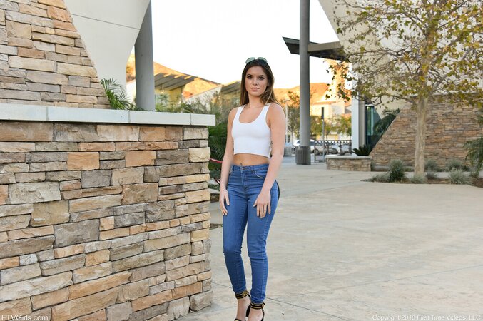 Model in blue jeans and jacket loves flashing her small boobs on camera