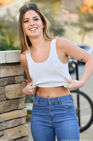 Model in blue jeans and jacket loves flashing her small boobs on camera