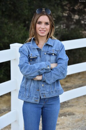 Model in blue jeans and jacket loves flashing her small boobs on camera