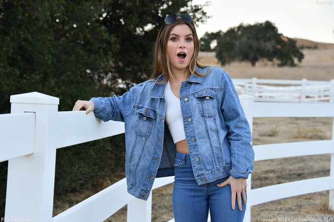 Model in blue jeans and jacket loves flashing her small boobs on camera