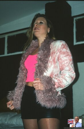 Erotic female in a fur coat smokes and gets penetrated in rear by older man
