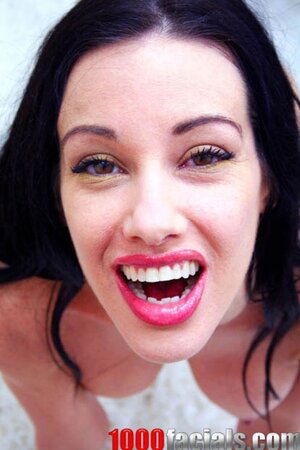 Black-haired MILF with round tits undresses to please guy with blowjob