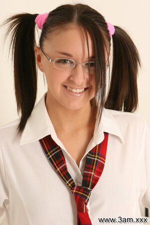 Bawdy babe in student uniform has a dummy to calm down her cock loving tendencies